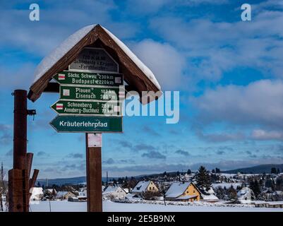 Hiking tour Schild in the wintry Schoenheide Vogtland Stock Photo