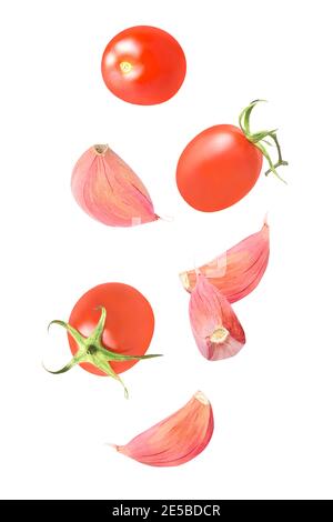 Seven pieces of flying fresh salad ingredients on white background Stock Photo