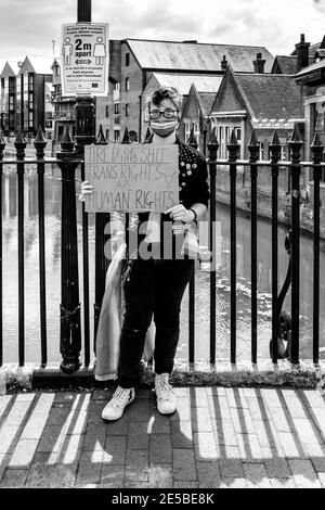 A Young Person Protesting For Trans Rights, High Street, Lewes, East Sussex, UK. Stock Photo