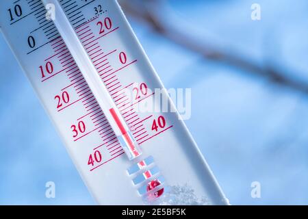 Thermometer shown outside with low temperature Stock Photo - Alamy