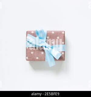 Dot pattern pink gift box isolated on white background. top view, copy space Stock Photo