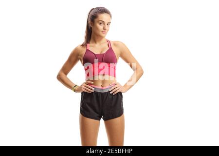 Sporty young woman posing isolated on white background Stock Photo