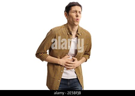 Young casual man suffering from stomach pain isolated on white background Stock Photo