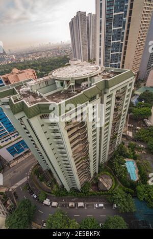 Makati, Metro Manila, Philippines - August 2018: Vertical photo of highrise skyscrapers in Makati City Stock Photo