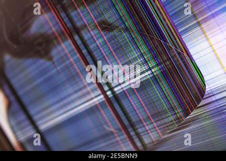 Black screen crack with colorful lines running across the broken monitor Stock Photo