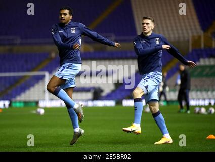 Coventry City's Sam McCallum (left) warms up on the pitch prior to the beginning of the Sky Bet Championship match at the St Andrew's Trillion Trophy Stadium, Birmingham. Picture date: Wednesday January 27, 2021. Stock Photo