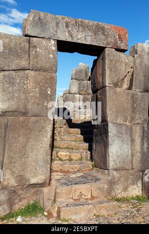 Stone door. View of Sacsayhuaman, Inca ruins in Cusco or Cuzco town, Peru Stock Photo