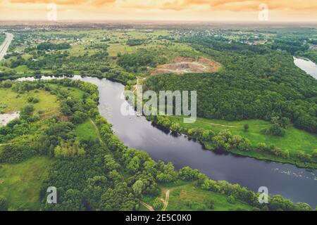 Landscape of a winding river (meandering river) in spring. View from above. Beautiful nature. Europe Stock Photo