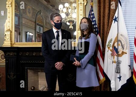 Washington, United States. 27th Jan, 2021. Antony Blinken, U.S. secretary of state, left, and his wife Evan Ryan stand during a swearing in ceremony at the White House in Washington, DC on Wednesday, January 27, 2021. The Senate yesterday confirmed Blinken, giving one of President Biden's longest-serving aides the task of resuming nuclear negotiations with Iran and restoring trust with allies shaken by four years of the Trump administration. Photo by Stefani Reynolds/UPI Credit: UPI/Alamy Live News Stock Photo