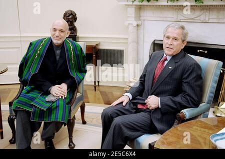 US President George W. Bush meets the President of Afghanistan Amid Karzai in the Oval Office at the White House in Washington, DC, USA on September 26, 2008. Photo by Olivier Douliery/ABACAPRESS.COM Stock Photo