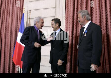 French President Nicolas Sarkozy speaks with French scientist Joseph Sifakis, laureate of the 2007 Turing Award, and Albert Fert, 2007 Physics Nobel Prize winner at a ceremony at the Elysee Palace in Paris, September 30, 2008. Joseph Sifakis and Albert Fert received the Grand Officier de l'Ordre National du Merite medal. Photo by Jean-Francois Deroubaix/Pool/ABACAPRESS.COM Stock Photo