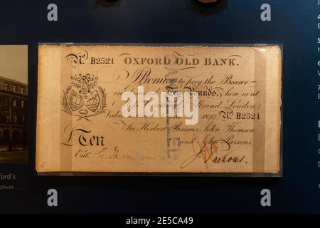 A cancelled Oxford Old Bank ten pounds note (1899), the Money Gallery, Ashmolean Museum, Oxford, UK. Stock Photo