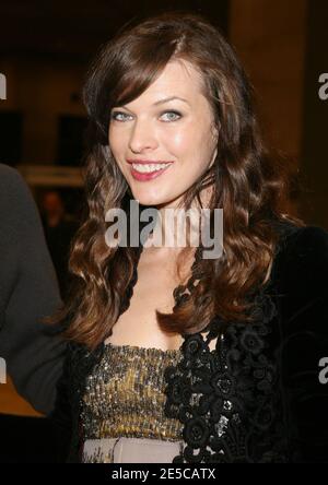 Milla Jovovich and Paul Andersen Paris Fashion Week - Spring/Summer ...