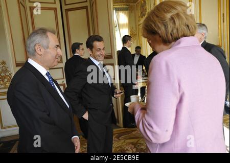 Exclusive. French President Nicolas Sarkozy and German Chancellor Angela Merkel during a summit to discuss the international financial crisis at Elysee Palace in Paris, France on October 4, 2008. Photo by Elodie Gregoire/ABACAPRESS.COM Stock Photo