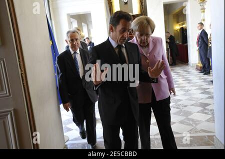 Exclusive. French President Nicolas Sarkozy receives German Chancellor Angela Merkel for a summit to discuss the international financial crisis at Elysee Palace in Paris, France on October 4, 2008. Photo by Elodie Gregoire/ABACAPRESS.COM Stock Photo