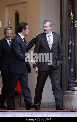 French President Nicolas Sarkozy, left, bids farewell to Belgium's Prime Minister Yves Leterme, right, following their meeting at the Elysee Palace, Paris, France, on October 6, 2008. Photo by ABACAPRESS.COM Stock Photo