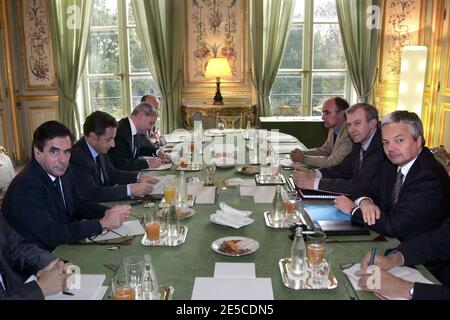 France's President Nicolas Sarkozy, second from left, Belgium's Prime Minister Yves Leterme, second from right, France's Prime Minister Francois Fillon, left, and Belgium's Finance Minister Didier Reynders, right, meet at the Elysee Palace in Paris France, on October 6, 2008. Photo by ABACAPRESS.COM Stock Photo