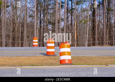 Orange and White Construction Barrels Stock Photo