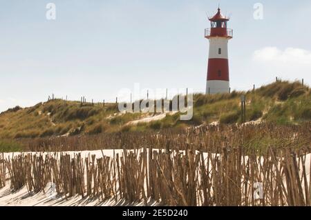 Lighthouse on the beach, in Sylt, Germany. Stock Photo