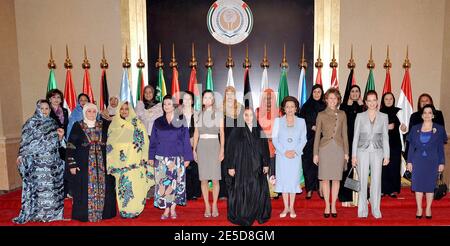 First ladies of Arab states (from L): Mauritania's Takabur Bint Ahmed of Mauritania, Palestine's Amina Abbas, Sudan's Widad Babakar, Tunisia's Laila Ben Ali, Jordan's Queen Rania, Bahrain's Sheikha Sabeeka, Egypt's Suzanne Mubarak, Syria's Asma Al Assad, Morocco's Lalla Salma and Lebanon's Wafaa Suleiman, pose for a group photo before the 2nd Arab Women's Conference in Abu Dhabi, United Arab Emirates, on November 11, 2008. Photo by Balkis Press/ABACAPRESS.COM Stock Photo
