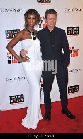 Model Iman and husband singer David Bowie arriving for the Keep A Child Alive's 5th Annual Black Ball held at The Hammerstein Ballroom in New York City, NY, USA on November 13, 2008. Photo by Gregorio Binuya/ABACAPRESS.COM Stock Photo