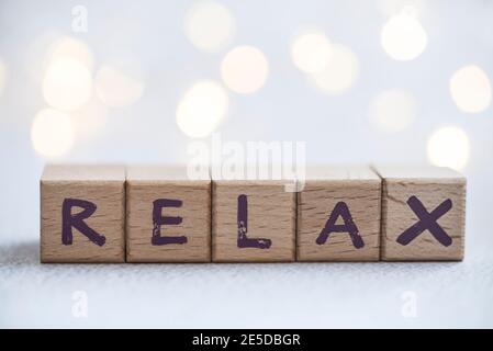Word Relax made from wooden building blocks Stock Photo
