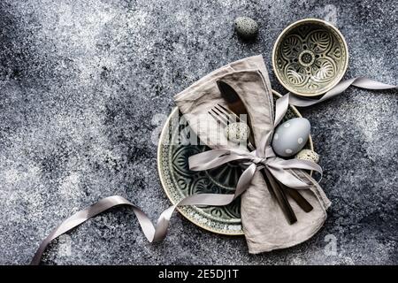 Easter place setting with painted Easter egg decorations Stock Photo