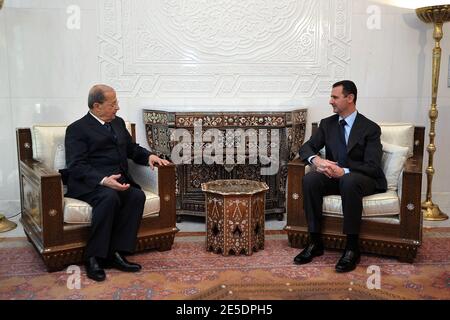 Syrian President Bashar Al Assad (R) receives hands Lebanese Christian opposition leader Michel Aoun at the 'People's Palace' in Damascus, Syria, on December 3, 2008. Aoun, a former opponent to Syria, is on a 3-day 'historic' visit to the country. He insisted that there is a 'major difference between Syria now and Syria of the late president Hafez Al Assad'. Photo by Balkis Press/ABACAPRESS.COM Stock Photo