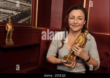 French actress Catherine Frot poses for our photographer after the 'Prix Raimu' Awards ceremony, held at the Palais Royal Theatre, in Paris, France, on December 15, 2008. The 'Raimu Awards' honor the best French comics actors, directors, and producers of the year. Photo by Christophe Guibbaud/ABACAPRESS.COM Stock Photo