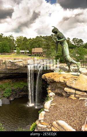 Gadsden, Alabama, USA - May 20, 2017: The nine-foot-tall bronze statue of Noccalula, a young Cherokee woman, who legend says plunged to her death at t Stock Photo