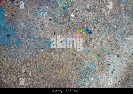 Concrete floor stained in many colors Stock Photo