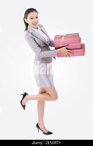 Oriental business woman with gift box high quality photo Stock Photo
