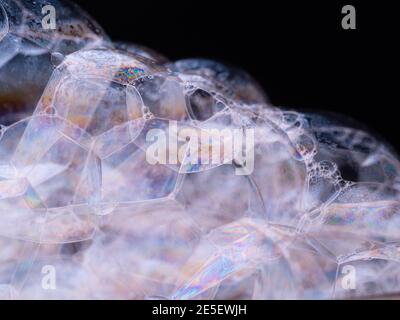 Pattern from soap foam. Abstract background with soap bubbles close up. Macro shot Stock Photo