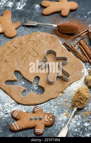 Gingerbread Men and biscuit dough Stock Photo