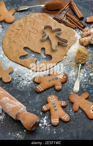 Gingerbread Men and biscuit dough Stock Photo