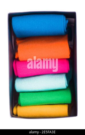 colored socks stacked on a white background Stock Photo