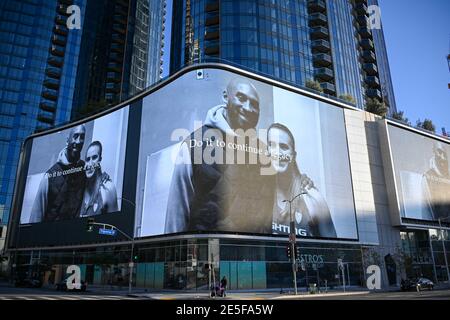 Sabrina Ionescu and Kobe Bryant appear in a Nike ad during near a memorial for Kobe Bryant and daughter Gianna near Staples Center, Tuesday, Jan. 26, Stock Photo