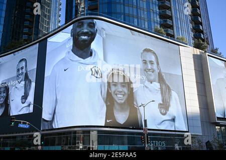 Sabrina Ionescu (right), Gianna Bryant (center) and Kobe Bryant appear in a Nike ad during near a memorial for Kobe Bryant and daughter Gianna near St Stock Photo