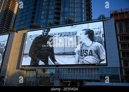 Sabrina Ionescu and Kobe Bryant appear in a Nike ad during near a memorial for Kobe Bryant and daughter Gianna near Staples Center, Tuesday, Jan. 26, Stock Photo