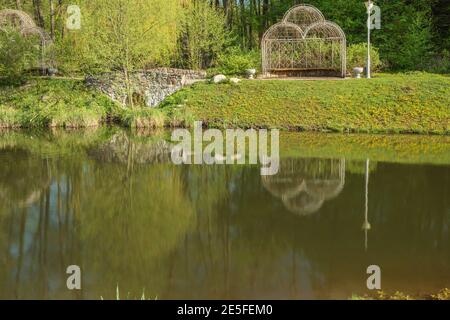 Beautiful gazebo on a small island in Feofaniya park, Kiev, Ukraine. This is a delightful place, beauty and tranquility reigns around. Stock Photo