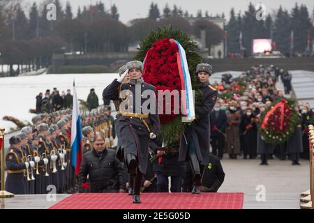 (210128) -- ST. PETERSBURG, Jan. 28, 2021 (Xinhua) -- A ceremony to mark the 77th anniversary of ending the Nazi siege of Leningrad during World War II is held at the Piskaryovskoye Memorial Cemetery in St. Petersburg, Russia, Jan. 27, 2021. Activities were held here to mark the 77th anniversary of ending the Nazi siege of Leningrad during World War II. Leningrad was besieged by the Nazi troops on Sept. 8, 1941 and the siege was lifted on Jan. 27, 1944. (Photo by Irina Motina/Xinhua) Stock Photo