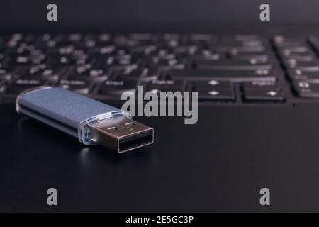 USB flash drive and laptop's USB connector Stock Photo