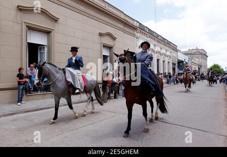 Women in a parade of gauchos in traditional costumes in Salta ...