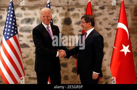 U.S. Vice President Joe Biden (L) shakes hands with Turkey's Prime Minister Ahmet Davutoglu during their meeting in Istanbul November 21, 2014. REUTERS/Murad Sezer (TURKEY - Tags: POLITICS)