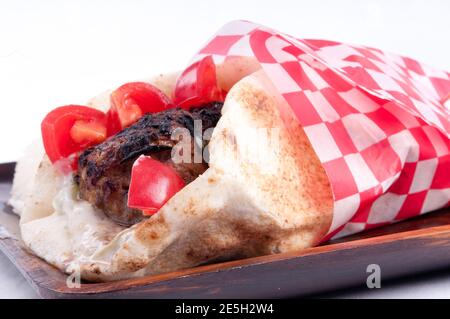 lean ground lamb gyro with rice and peas Stock Photo