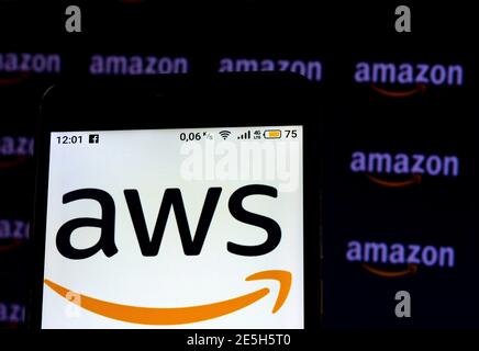 In this photo illustration an Amazon Web Services logo seen displayed on smart phone Stock Photo
