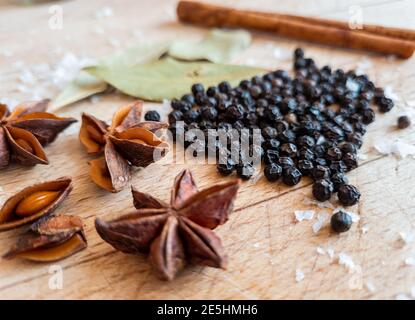 A selections of cooking spices on a wooden top. Stock Photo