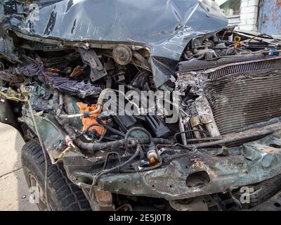 Voronezh, Russia - Juny 22, 2020: Front part of a passenger car smashed in an accident Stock Photo