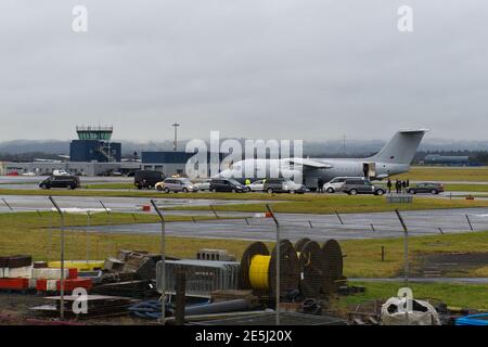 Glasgow, Scotland, UK. 28th Jan, 2021. Pictured: The UK Prime Minister Boris Johnson arrives off his plane at Glasgow Airport signalling the start of his Scotland visit. His visit has been parred by controversy due to the travel ban which the Scottish First Minister Nicola Sturgeon has put in place questioning if the PM's visit is an essential journey or not. Mr Johnson is up on important business to maintain the ties with the union. Credit: Colin Fisher/Alamy Live News Stock Photo