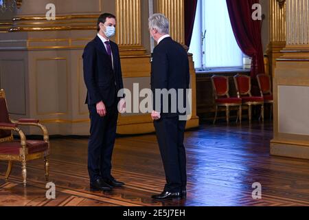 Prime Minister Alexander De Croo and King Philippe - Filip of Belgium pictured during a New Year's reception organized by the Royal Family for the Bel Stock Photo